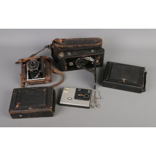 83 - A quantity of cameras to include Zeiss Ikon Derval, Kodak Eastman, Kodak Disc 4000, etc.