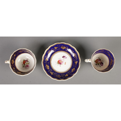 581 - Three pieces of Rockingham porcelain of similar design, comprising of a cup and saucer and smaller c... 