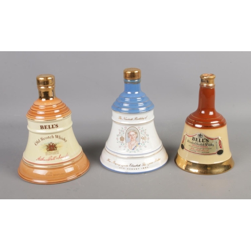 95 - Three sealed and full Bell's Whiskey Bell Decanters including 90th birthday of the Queen Mother.