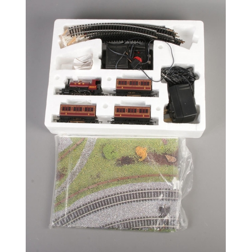 96 - A Hornby 00 Gauge Midland Cross Country set along with Track mat and track.