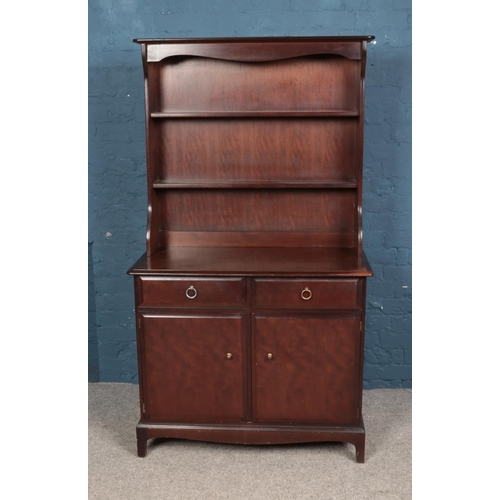 590 - A mahogany dresser featuring fitted drawers.