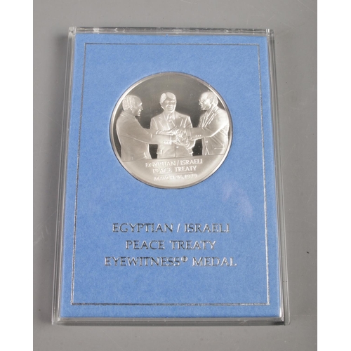 411 - Franklin Mint; A Limited Edition Egyptian/Israeli Peace Treaty Eyewitness Medal struck in sterling s... 