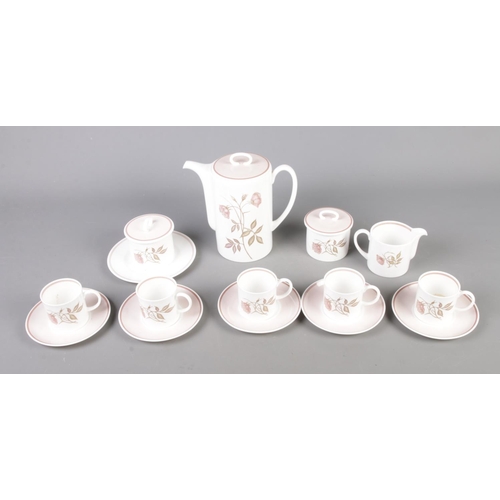 105 - A Susie Cooper Talisman (C1139) pattern tea service to include tea pot, sugar bowl, tea cups and sau... 