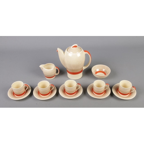 115 - A Susie Cooper art deco Kestrel shape, banded tea service to include tea pot, sugar bowl, milk jug, ... 