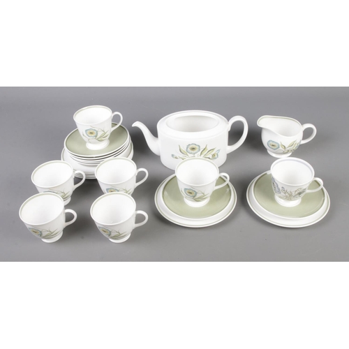 118 - A Susie Cooper Katina pattern tea service to include tea pot, tea cups and saucers.