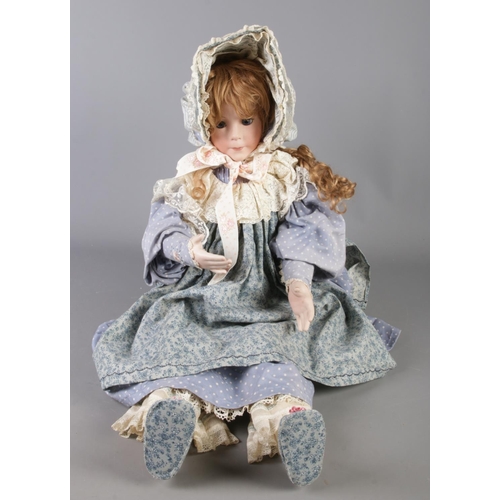 146 - A large Elizabeth Wilson bisque doll.