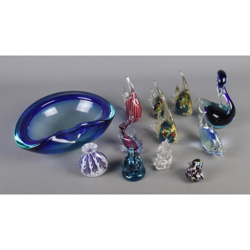 25 - A collection of art glass to include various fish, miniature vase, elephant, etc.