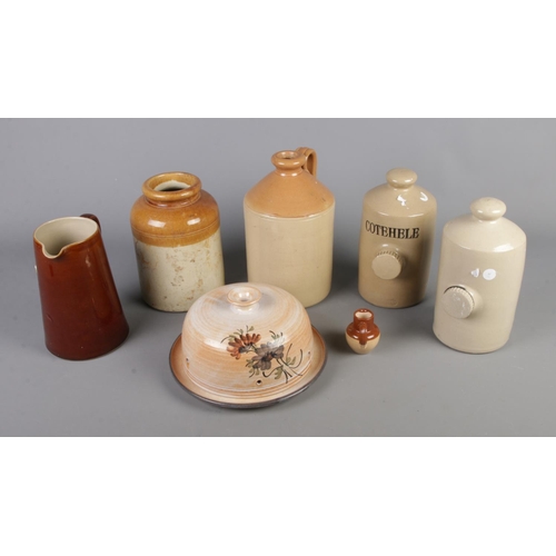 149 - A quantity of stoneware to include flagon, jugs, etc.