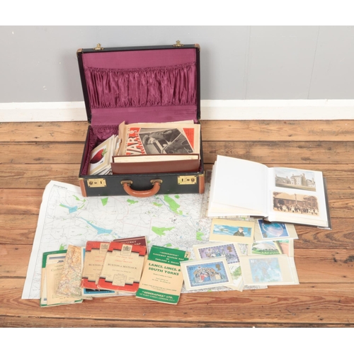 169 - A suitcase containing an assortment of postcards and vintage ordinance survey maps including 4:1 sca... 