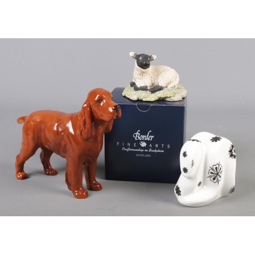 73 - Three ceramic/composite animal figures. Includes boxed Border Fine Arts sheep, Royal Crown Derby sna... 