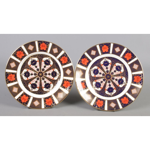 379 - Two Royal Crown Derby Imari plates, pattern 1128. Diameters 21.5cm and 22cm.