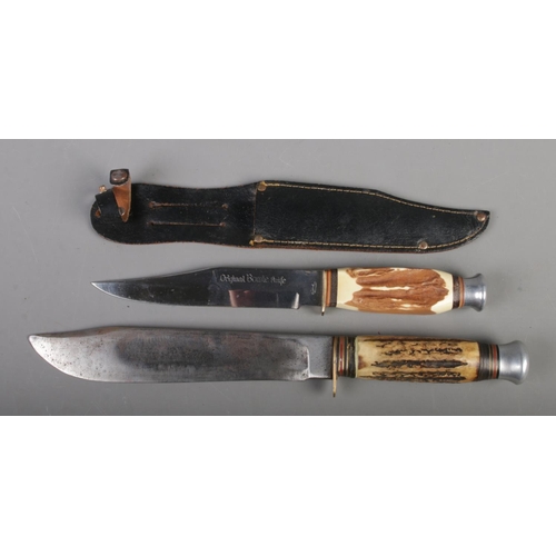 387 - Two hunting knives. Includes Solar 'Original Bowie Knife' with leather sheath.