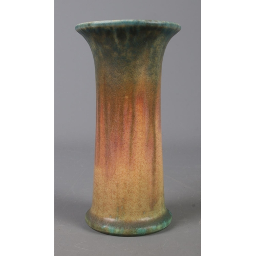 404 - A Ruskin Pottery lily vase with blue, orange and green glaze. Date stamped 1933. Height 15cm.