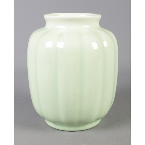 406 - A Royal Lancastrian vase shape number 3302 in pale green glaze. Approx. height 20cm.