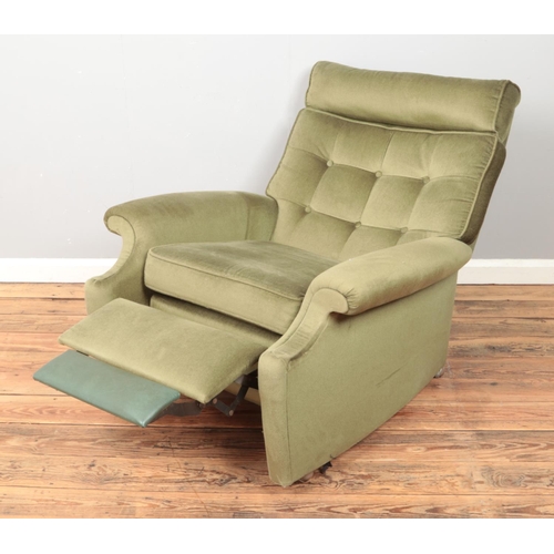 422 - A Parker Knoll Model N30 reclining arm chair.