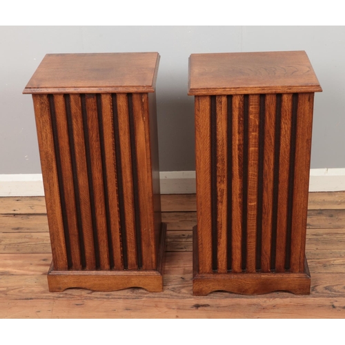 428 - A pair of oak speaker covers. Approx. external dimensions 37cm x 33cm x 70cm.