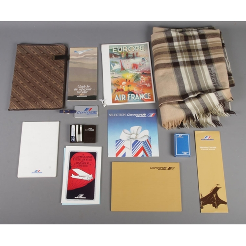 121 - A quantity of Concord memorabilia. Includes playing cards, blanket, paperwork, etc.