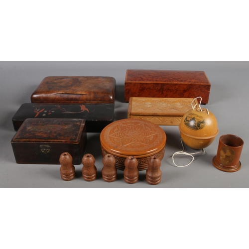 157 - A box of woodenware. Includes Mauchline ware, walnut jewellery box, etc.