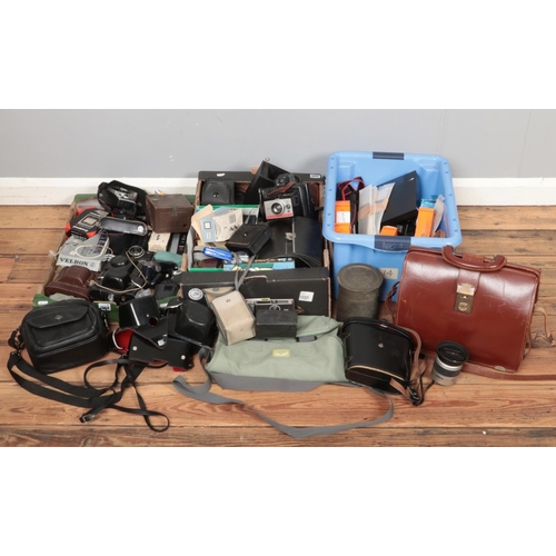 175 - Three boxes of camera equipment. Including cameras, camera bags, binocular cases, Agfa, Vivitar, Pol... 