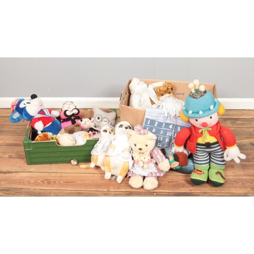 185 - Two boxes of assorted soft toys, including large knitted clown and 'Cuddles Time' meerkats.