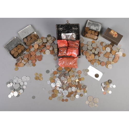 66 - A large quantity of pre and post decimalisation UK and world coins, including silver sixpences, half... 