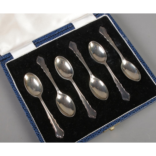 419 - A cased set of six silver demitasse spoons. Assayed Sheffield 1963 by Mappin & Webb Ltd. 45g.