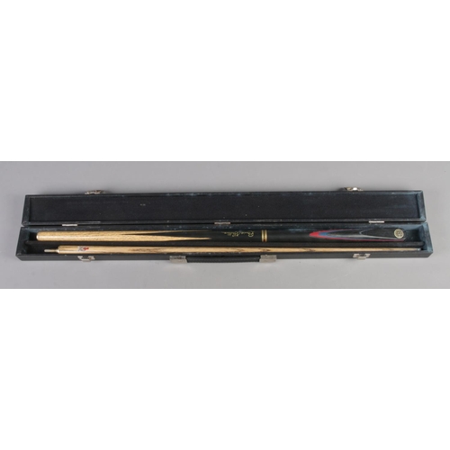 83 - A two-piece BCE Ronnie O'Sullivan snooker cue in hard case.