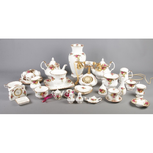 89 - A collection of mainly Royal Albert Old Country Roses ceramics. To include Moss Rose telephone, teap... 