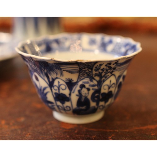 107 - A small collection of Oriental blue & white ceramics. Includes vase, dish and three bowls.