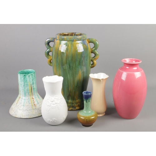132 - A collection of vases. Includes large Viking, Dartmouth, Kaiser, Bretby etc.