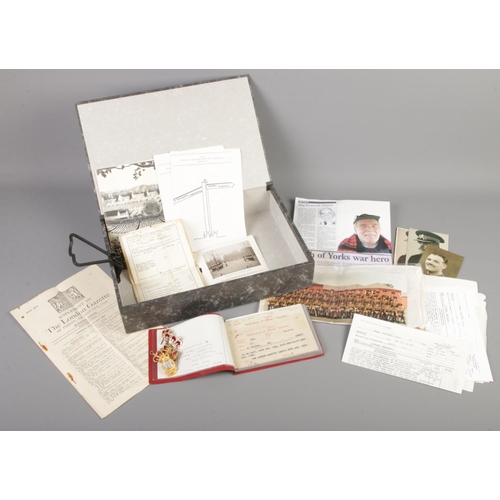 19 - A box of ephemera and badges. Includes military information relating to Major Kenneth Higton, Royal ... 