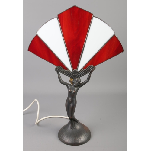 24 - An art deco style figural table lamp. Formed as a female figure holding a fan. (45cn)