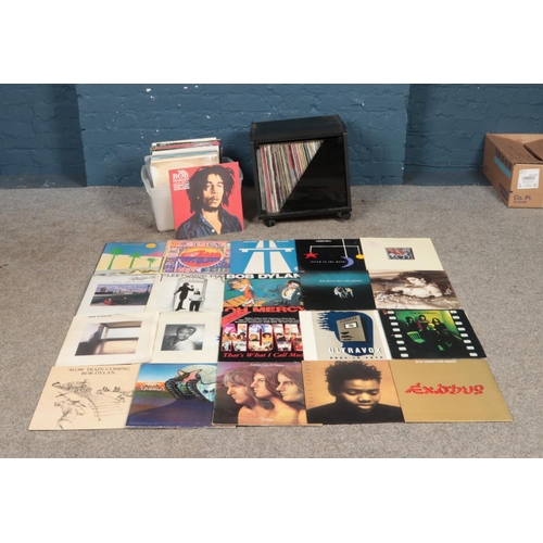 149 - One box and one cabinet of records of mainly rock and pop to include The Cure, Kraftwerk, Paul Simon... 