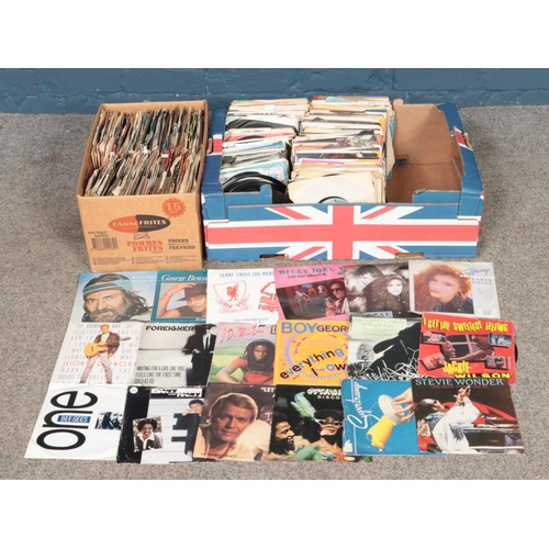 158 - Two boxes of assorted single records. To include George Benson, Tiffany, Billy Joel, Supertramp and ... 