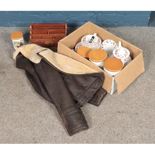 159 - A box of miscellaneous to include Winalex Ware tea service, Paragon leather jacket, Portmerion Pomon... 