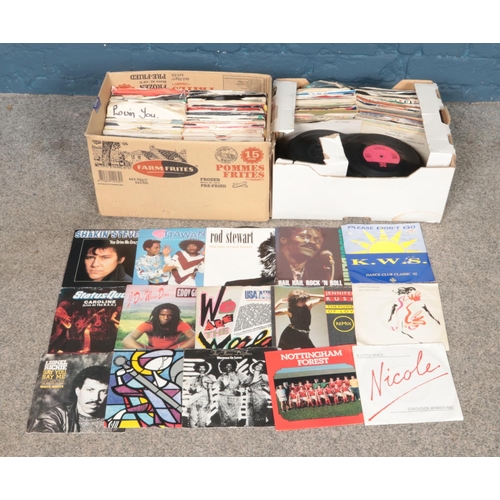 164 - Two boxes of single records. To include Shakin Stevens, Status Quo, Ottawan, KWS and OMD etc.