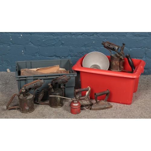 179 - Two boxes of vintage tools and metalwares, to include Veritas blow torch, irons and boxed mincer.