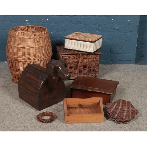 220 - A collection of mainly wicker items, to include large clothes basket, child's wooden sheep and tray.