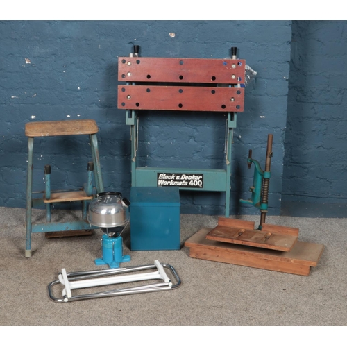 234 - A collection of assorted items to include Black and Decker Workmate 400 workbench, metamorphic stool... 