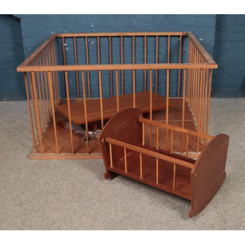 236 - A child's play pen along with cot.