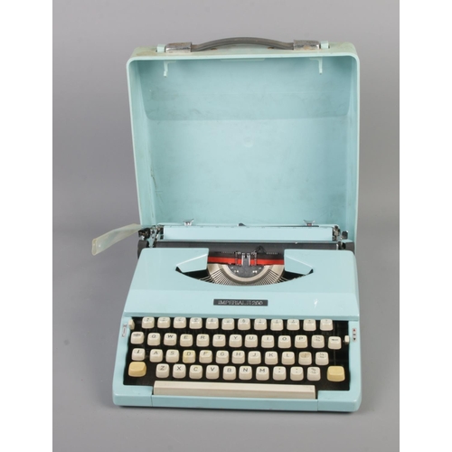 245 - An Imperial 200 pale blue typewriter in case.