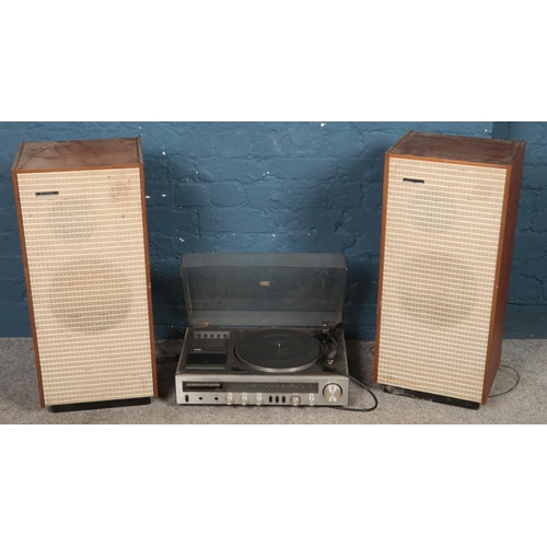 248 - A Sanyo Hi-fi stereo music system along with two speakers. Model DXT 5406K.