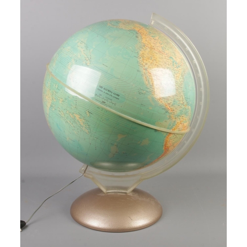 261 - A large globe by Purnell & Sons Ltd, The Illumina Globe. Height 57cm.