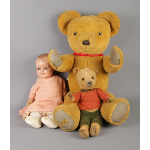 269 - A large vintage Merry Thought Bear along with Armand Marseille doll stamped 551/4 and one other smal... 