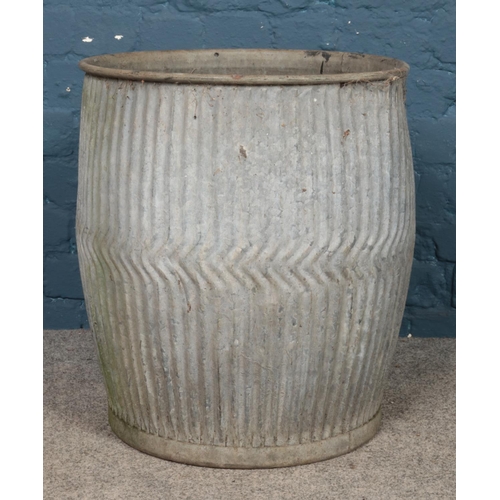 271 - A galvanised metal dolly tub. 53cm high.