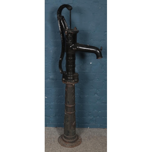 280 - A cast iron water pump. Marked NP75. (140cm)