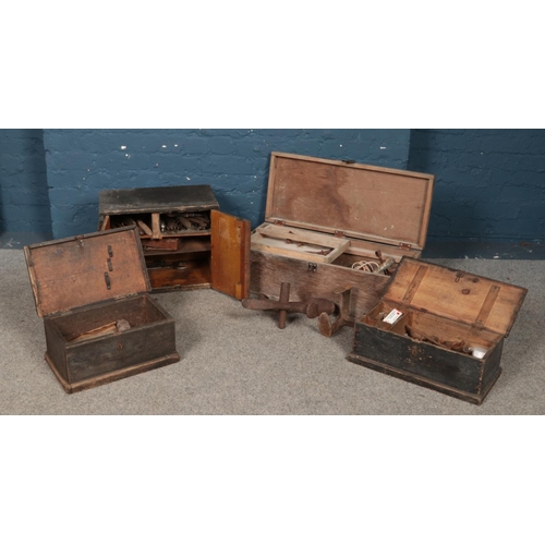 281 - Four vintage crates containing a good assortment of tools. Includes spanners hammers, drill bits and... 