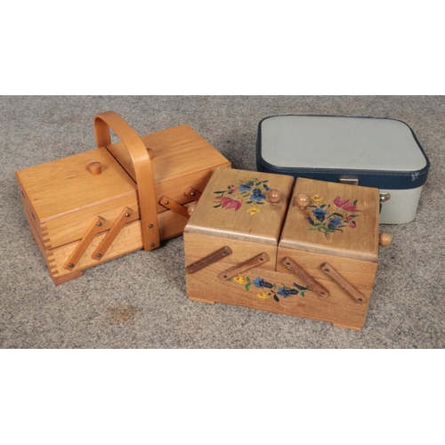 283 - Three vintage sewing boxes and contents, to include two cantilever examples.