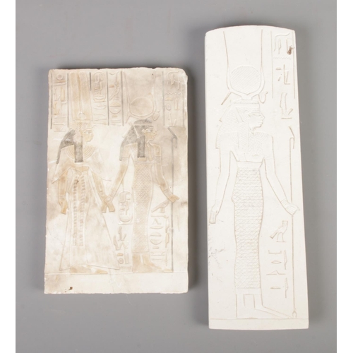 47 - Two plaster plaques depicting Egyptian scenes.