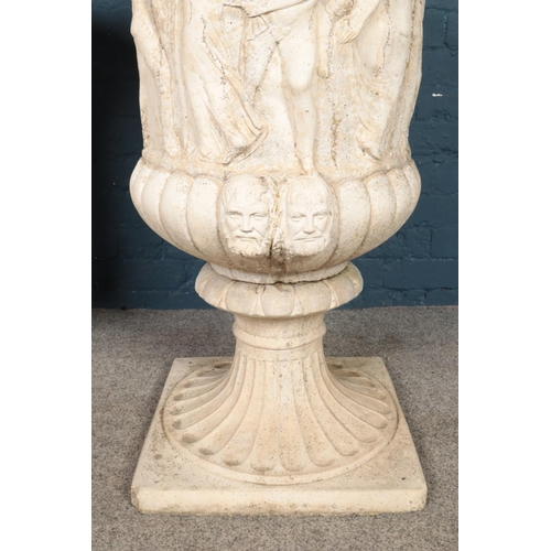 319 - A large pair of cast concrete Medici style garden urns, with classical decoration, on fluted socle b... 